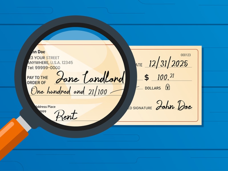 Personal check with the payee line magnified.